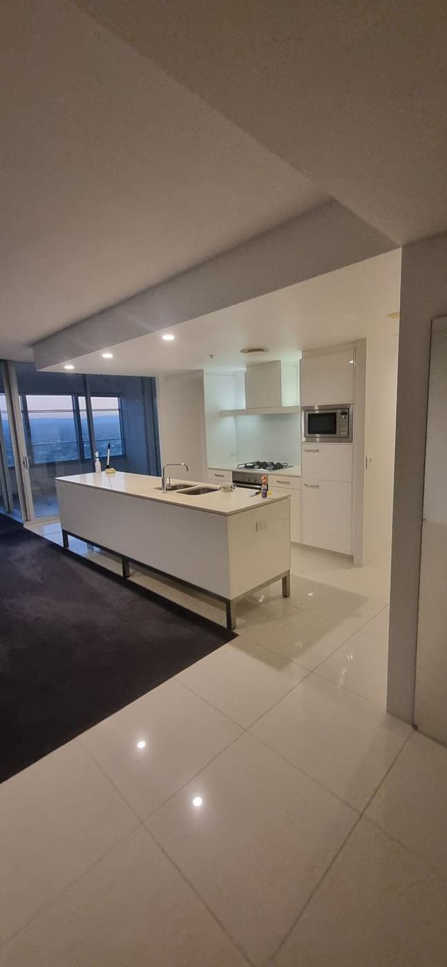 Kitchen and tiled floor in an empty apartment